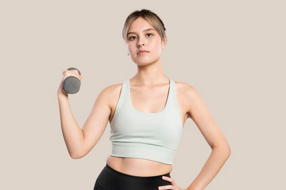 Woman with a dumbell