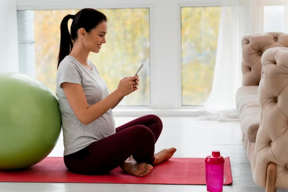 Pregnant Woman Using a Yoga Ball